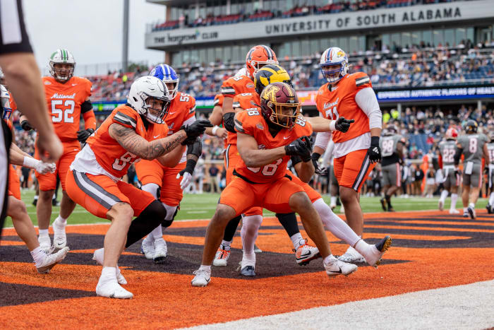 Brevyn Spann-Ford celebrates his touchdown catch
